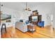 Bright and airy living room with hardwood floors and an entertainment area, offering a cozy and inviting space at 4209 Wildwood Lndg, Charleston, SC 29420
