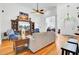 Inviting living room with hardwood floors, a ceiling fan, and a stylish entertainment center at 4209 Wildwood Lndg, Charleston, SC 29420