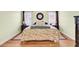 Bright and airy main bedroom featuring hardwood floors and neutral decor at 4209 Wildwood Lndg, Charleston, SC 29420