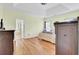 Spacious main bedroom with hardwood floors and ensuite bath at 4209 Wildwood Lndg, Charleston, SC 29420
