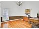 Bright office space featuring hardwood floors, wainscoting, and natural light from the large window at 4209 Wildwood Lndg, Charleston, SC 29420