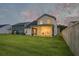 Spacious backyard with a covered porch, perfect for outdoor gatherings and relaxation at 4374 Cotton Flat Rd, Summerville, SC 29485