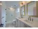 Bathroom featuring double vanity, framed mirrors and glass enclosed shower at 4374 Cotton Flat Rd, Summerville, SC 29485