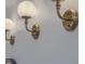 Bathroom features attractive golden sconces at 4374 Cotton Flat Rd, Summerville, SC 29485