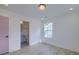 Bedroom featuring ensuite bathroom, large window, and wood flooring at 4374 Cotton Flat Rd, Summerville, SC 29485