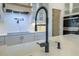 Modern kitchen with matte black fixtures at 4374 Cotton Flat Rd, Summerville, SC 29485
