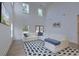 Bright, airy living room with high ceilings, modern furniture, and lots of natural light at 4374 Cotton Flat Rd, Summerville, SC 29485