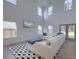 Bright living room with vaulted ceilings, ample natural light, comfortable seating, and stylish décor at 4374 Cotton Flat Rd, Summerville, SC 29485