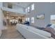 Spacious, open-concept living area with modern kitchen, dining, and living spaces, and lots of natural light at 4374 Cotton Flat Rd, Summerville, SC 29485