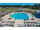 Aerial shot of the community pool, perfect for sunny days and relaxation, and plenty of lounge chairs at 4374 Cotton Flat Rd, Summerville, SC 29485
