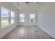 Bright room featuring large windows, recessed lighting, and modern flooring at 4374 Cotton Flat Rd, Summerville, SC 29485