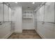 Spacious walk-in closet with abundant shelving and organizational features at 4374 Cotton Flat Rd, Summerville, SC 29485