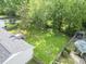 Large backyard with a deck and pool/entertainment area at 5 Drummond Ct, Charleston, SC 29414