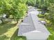 A large, grassy backyard with a wooden deck at 5 Drummond Ct, Charleston, SC 29414