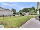 Large backyard with black fence and easy access to the porch and outdoor living space at 5013 Franconia Dr, Summerville, SC 29485