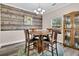 Charming dining room with wood accents and stylish chandelier, and unique decor at 5013 Franconia Dr, Summerville, SC 29485