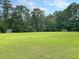 A wide, grassy community field with soccer goals, perfect for sports and recreational activities at 5013 Franconia Dr, Summerville, SC 29485