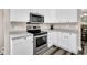 Kitchen with stainless appliances and grey countertops and modern cabinets at 5013 Franconia Dr, Summerville, SC 29485