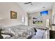 Bedroom featuring tray ceilings, hardwood flooring, and lots of natural light at 5013 Franconia Dr, Summerville, SC 29485