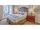 Comfortable bedroom with a bed and access to the balcony at 5802 Palmetto Dr # B314, Isle of Palms, SC 29451