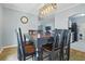 Eat-in dining room area with hanging light fixture and nice dining set at 607 Greencastle Dr, Goose Creek, SC 29445