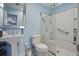 Bathroom features a pedestal sink, toilet, and a glass shower at 607 Greencastle Dr, Goose Creek, SC 29445