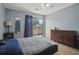 Bright bedroom features sliding glass doors, bed and two dressers at 607 Greencastle Dr, Goose Creek, SC 29445