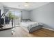 Bedroom with modern décor, a large window, desk, and a comfortable bed at 607 Greencastle Dr, Goose Creek, SC 29445
