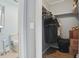 Walk-in closet with hanging clothes and storage shelves at 607 Greencastle Dr, Goose Creek, SC 29445