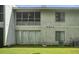 Exterior view of home featuring screened in back porch, windows, siding, and yard at 607 Greencastle Dr, Goose Creek, SC 29445