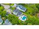 Expansive backyard featuring a modern pool, patio, and lush landscaping surrounding the elegant home at 619 Thomas Glenn Ct, Charleston, SC 29412
