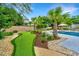 Putting green in backyard with in-ground pool at 619 Thomas Glenn Ct, Charleston, SC 29412