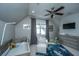 Bedroom with vaulted ceiling, ceiling fan, crib, accent rug, and neutral decor at 619 Thomas Glenn Ct, Charleston, SC 29412