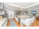 Bright, open kitchen with a large island, modern appliances, and seamless flow to the living area, perfect for entertaining at 619 Thomas Glenn Ct, Charleston, SC 29412