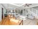 Open concept living room and kitchen with ample seating, hardwood floors and a seamless flow for entertaining and Gathering living at 619 Thomas Glenn Ct, Charleston, SC 29412