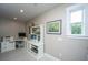 Office area with built in shelving, neutral walls, and a bright window at 619 Thomas Glenn Ct, Charleston, SC 29412
