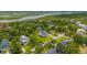 An aerial view showcasing a beautiful home surrounded by lush greenery in a serene neighborhood at 637 Lynne Ave, Charleston, SC 29412