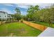 Spacious backyard with a well-maintained lawn and privacy fence at 637 Lynne Ave, Charleston, SC 29412