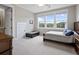Bright bedroom with large windows, neutral carpet and ensuite bathroom at 637 Lynne Ave, Charleston, SC 29412