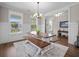 Charming dining room with ample natural light and a casual bench at 637 Lynne Ave, Charleston, SC 29412