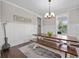 Cozy dining room featuring stylish lighting and wainscoting detail at 637 Lynne Ave, Charleston, SC 29412