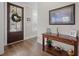 Welcoming foyer with a decorative wreath and hardwood floors at 637 Lynne Ave, Charleston, SC 29412