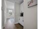 Hallway view into a breakfast nook with adjacent kitchen cabinets and a coffee maker on the counter at 637 Lynne Ave, Charleston, SC 29412