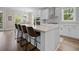Modern kitchen island featuring bar seating and light countertops at 637 Lynne Ave, Charleston, SC 29412