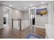 Spacious landing area with beautiful hardwood flooring and natural light at 637 Lynne Ave, Charleston, SC 29412