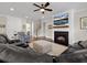 Comfortable living room with a fireplace, hardwood flooring, and plush seating at 637 Lynne Ave, Charleston, SC 29412