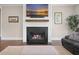 Elegant living room with a sleek fireplace, neutral decor, and a comfortable seating arrangement at 637 Lynne Ave, Charleston, SC 29412