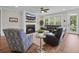 Inviting living room features a fireplace, hardwood floors, and ample seating, perfect for relaxation at 637 Lynne Ave, Charleston, SC 29412