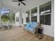 Relaxing screened porch with comfortable seating, perfect for enjoying the outdoors at 637 Lynne Ave, Charleston, SC 29412