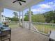 Inviting screened porch offering views of the lush backyard at 637 Lynne Ave, Charleston, SC 29412